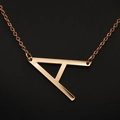 Elegant rose gold necklace featuring a minimalist letter A pendant on a fine chain - Rose Gold A