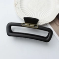 Glossy black square hair claw clip with golden min min logo detail for women - Matte Black Letter Gold Label