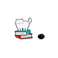 Cute white cartoon cat standing on colorful books enamel pin with black rubber clutch - White Cat Sleeping on Books