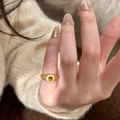 Brushed gold butterfly ring with yellow cat eye stone and white side crystals - Cat Eye Stone Gold Ring