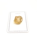 Macro shot of a raw citrine crystal specimen on a white card with thank you text - Citrine
