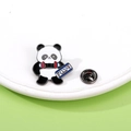Panda enamel pin featuring a gamer panda holding a keyboard with rubber clasp - Listening to Music (C2536-12)