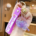 Purple lollipop liquid quicksand keychain with Good Luck strap and golden bell charm - Noctilucent Bubble Bead Lollipop-Purple