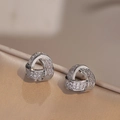 Silver woven knot earrings with micro-pave cubic zirconia in a geometric design - Cross Knot Three-Ring Style (E0388) / Silver