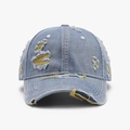Distressed light blue washed denim baseball cap with retro frayed hole details - Medium Blue Denim with Yellow Stitching