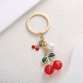 Sweet cherry pearl keychain with red translucent spheres and golden metal ring - Transparent Red Cherry