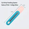 Pink and blue cat strip feeder spoon with slider mechanism, length 21cm for wet treats - Pink Spoon + Indigo Lid