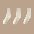 Off-white ribbed cotton mid-calf socks for women featuring a minimalist knitted design - Solid Slouch Socks (Beige)