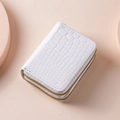 Compact white crocodile pattern leather card holder with dual golden zippers for women - White