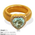 Golden heart-shaped zircon ring with light blue stone and ribbed stainless steel band - US Size 6 / Gold with Light Blue Zircon