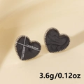 Macro detail of heart stud earrings with size labels 1.3cm and 1.5cm on yellow background - Irregular Heart Oil Dripping Style-Silver Black (D268-S-B)