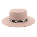 Detail of pink straw boater hat featuring cow print ribbon and silver buckle - M (56-58cm) / Pink