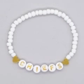 Handmade white bead bracelet with golden CHIEFS lettering and heart charms - CHIEFS Letter Bracelet (GZ-B24010602A)