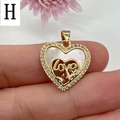 Macro view of gold heart pendant with mother of pearl and crystal inlay on finger - Style H-Love Butterfly Letter MOP