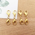 Vier goldene Karabinerverschlüsse aus Zinklegierung für DIY Schmuckherstellung - Doppelkopf-Karabinerverschluss / KC Gold