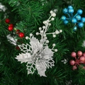 Elegant silver glitter Christmas flower with berry branches on green festive tree - Silver