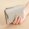 Light grey short quilted wallet with gold flower snap button and zipper pocket - Light Gray