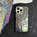 Detail of premium iPhone case with silver ripple texture and metallic camera protection - Obsidian Black / iPhone 11