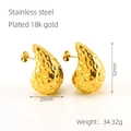Detailed view of 18K gold plated stainless steel teardrop earrings with hammered texture - 18K Gold Plated / Gold