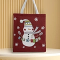 Red canvas Christmas tote bag with embroidered snowman and Let it Snow festive design - Style 2