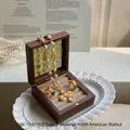 Square walnut wood jewelry box with glass lid for rings and necklaces, 10.5cm size - Walnut Tea Glass Milk Tea Ring Box