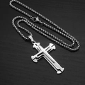 Macro shot of silver layered cross pendant with bead chain on dark textured surface - 60cm Box Chain / Steel