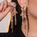 Sparkling crystal bow tassel long earrings with champagne rhinestones for a luxury look - Yellow