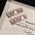 Handmade press-on nails with pink base, silver glitter gradients and pearl accents - Extra Small (XS) / Super Short Trapezoid (2164)