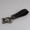 Premium black suede car keychain with dark grey metal horseshoe D-ring and swivel link - Matte Gunmetal/Black