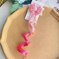 Dettaglio di extension capelli sfumati rosa per bambine con fermaglio a fiocco glitter - Pezzo Singolo / Rosa