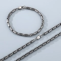 Vista detallada del conjunto de collar y pulsera de cadena rectangular de acero - Pulsera 4.5mmx21cm / Negro Mate