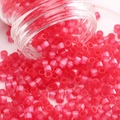 Vibrant rose red cylindrical glass seed beads pouring from a clear jar for DIY jewelry - Style 15 2.5mm Red (740pcs)