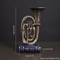 Escultura vintage de trompeta de bronce en base de libro azul Lo que el viento se llevó - Trombón Retro Bronce (7111-58)