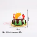 Artificial cake pendant in green with chocolate drip, orange slice and pink lanyard - Brown Cream + Orange Segment
