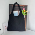 Close-up of black hollow knit tote bag with heart pattern and tulip flower decor - Black Diagonal Stripes