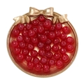 Loose red round beads for DIY jewelry displayed in a gold tray with bow accent - Faux Jade Glaze Bead - Red