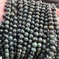 Close-up of polished natural green New Bird stone beads for DIY jewelry making - Natural New Sparrow Stone/Serpentine 4mm (Approx. 90pcs) Strand