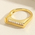 Close-up of golden double-layer ring featuring clear rectangular zircon stones setting - Rectangular White Zirconia Style