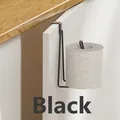 Close-up of black iron toilet paper holder hanging on white cabinet door with paper roll - Triangle Style / Black