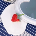 Realistic strawberry hair clip with red textured body and green leaves on gold base - Strawberry