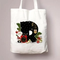 White canvas Christmas tote bag with large letter R and festive Santa Claus design - Letter R