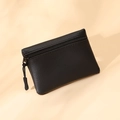 Mini portamonete nero in pelle PU con trama litchi, zip e tiretto in corda intrecciata - Nero