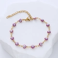Golden chain bracelet featuring multiple purple heart charms with Evil Eye patterns - Purple
