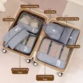 9-piece grey travel organizer set with laundry bags and shoe pouch in suitcase - Gray 9-Piece Set