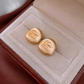 Golden brushed metal irregular round stud earrings featuring a chic matte texture - Golden Irregular Relief Letters (72#)