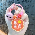 Kreativer rosa Acryl-Schlüsselanhänger mit Glücksbringer und Glocke für Taschendeko - HAKUNA MATATA