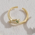 Adjustable gold-plated snake ring featuring green gemstone eyes and pink micro-pavé crystals - Snake / Gold