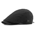 Classic black breathable ivy cap with a textured finish and vintage metal side logo - Adjustable / Black