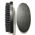 Men's facial beard brush with black curved wooden handle and bristles from two angles - He Wood Black Bristle 11.2x5.5x2.5CM
