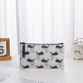 Large beige canvas cosmetic bag with blue whale pattern and matching wrist strap - Whale (No Label) / Large